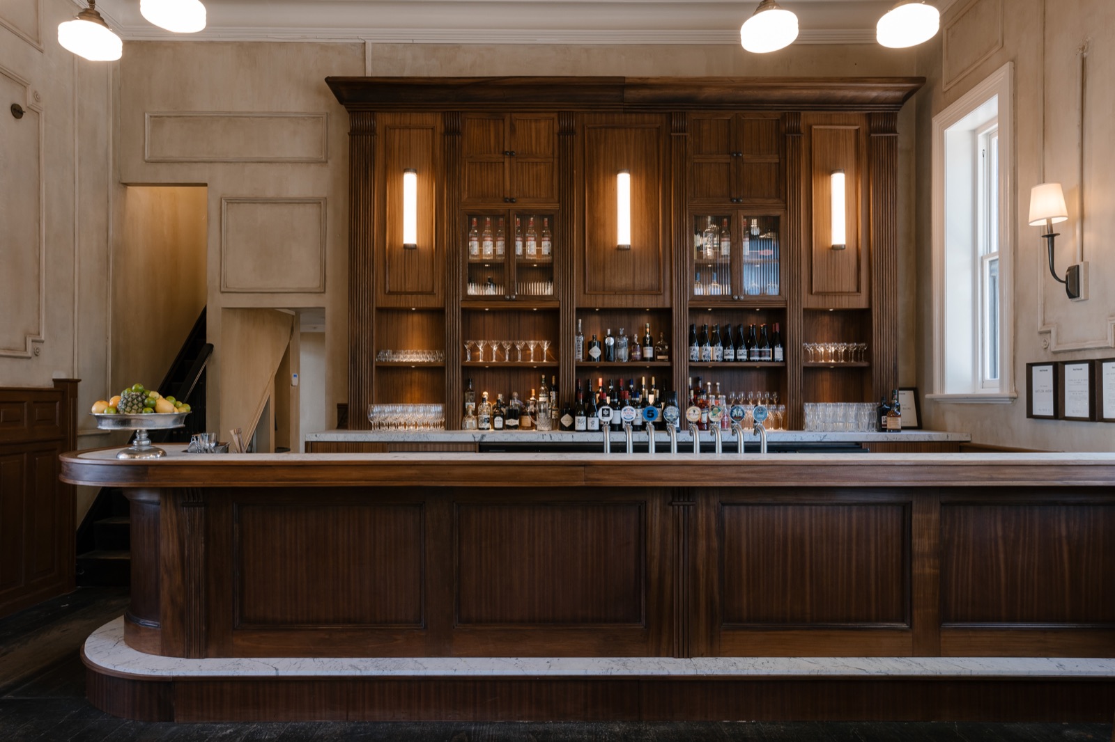 The timber bar and back bar in the public bar