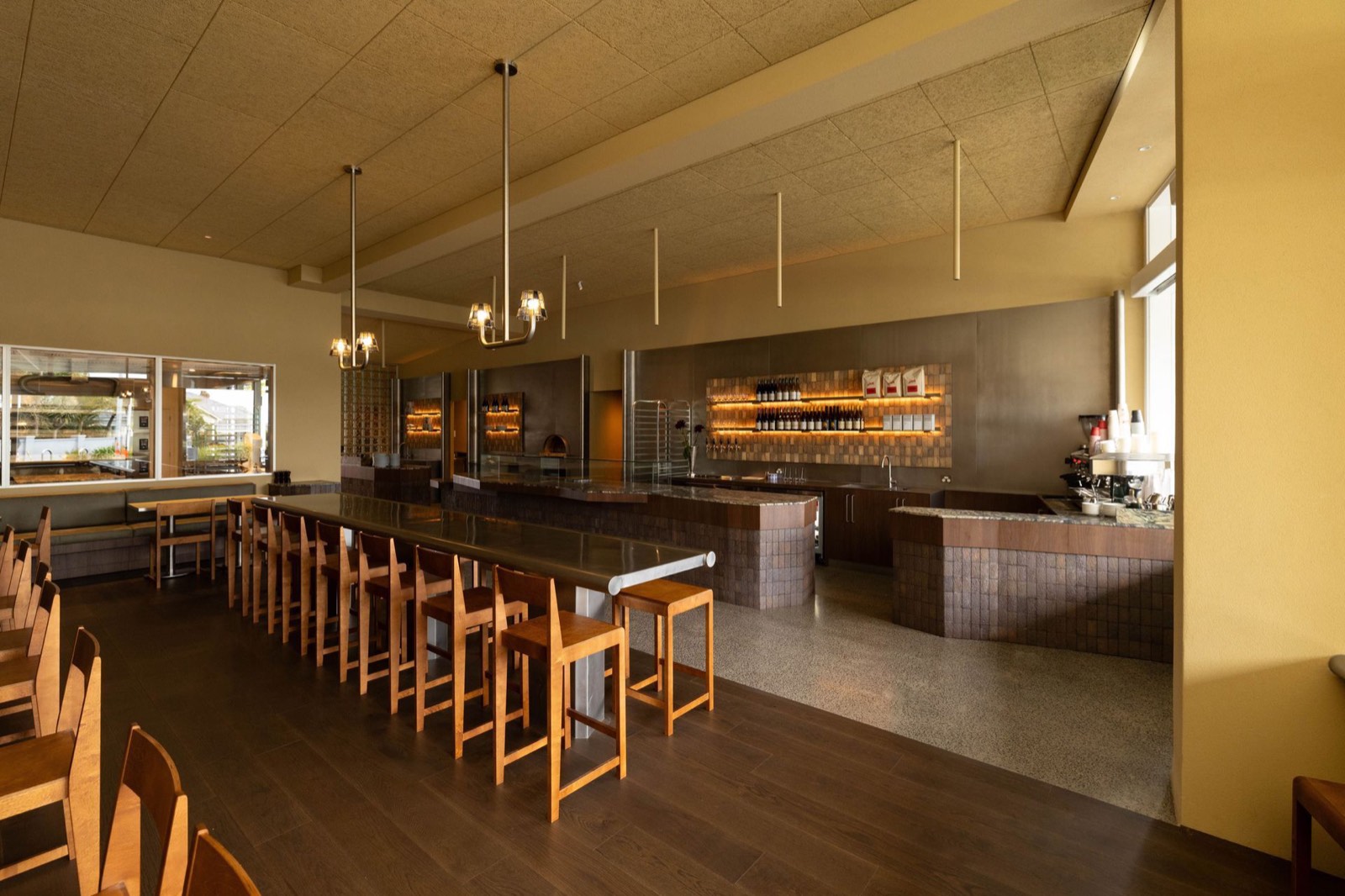 The long bar and stools at Mother
